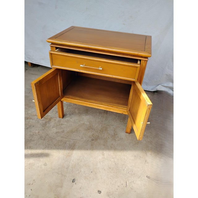 A Mid Century Nightstand from the Thomasville Furniture Company. This was made during the 1970's and is from Thomasville’s...