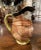 Charming and full of character, this antique barbotine pitcher takes the form of a jovial monk with a warm, smiling...