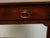A French Louis XV style walnut desk from the 19th century, with two drawers and cabriole legs. Created in France during...