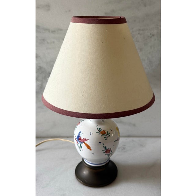 Vintage faience or ceramic and brass small table lamp with hand painted birds and floral design. This small lamp would be...