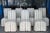 Set of seven vintage Designmaster Parsons-style skirted dining chairs, featuring clean architectural lines softened by...