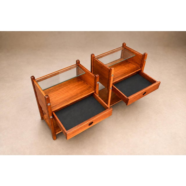 A refined pair of “Yara” side tables designed by Sergio Rodrigues in Brazil during the 1960s. Crafted in richly figured...