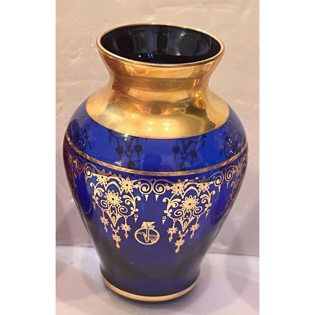 Beautiful set of three authentic Vecchia Murano art glass vases, each marked VR. These elegant Italian pieces feature rich...