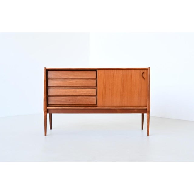 This elegant small sideboard was produced by Bosteels Meubelen, Belgium, circa 1960. A refined example of Belgian mid-...