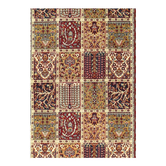 A contemporary, colorful machine woven synthetic Persian Bakhtiari-style area rug. This colorful carpet features a large...