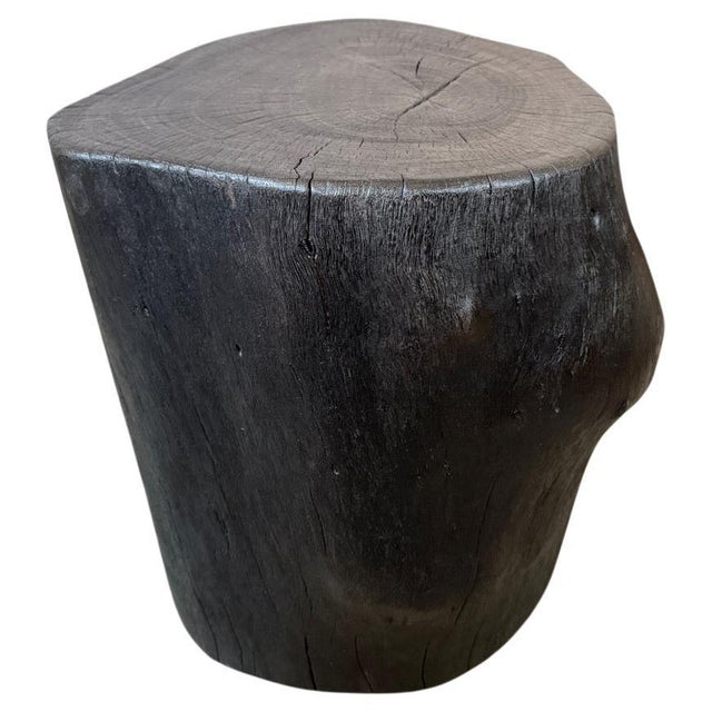 Reclaimed lychee wood side table. Charred, sanded and sealed whilst respecting the natural organic shape and revealing the...