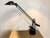 Vintage postmodern counterbalance desk lamp in a matte black finish, featuring an elongated adjustable arm, dual...