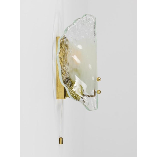 A beautiful, high-quality mid-century modern wall lamp from the 1970s, manufactured by j.t. Kalmar, vienna, austria. The...