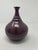 Beautiful purple/plum colored mid-century ceramic vase.