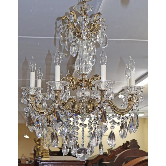 Schonbek La Scala 8 Light Gold Color Crystal Chandelier Dimensions : 25 X 25 X 34" Tall This stunning chandelier was made...