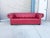 This iconic Chesterfield sofa makes a bold, luxurious statement with its vibrant crimson red leather upholstery and...