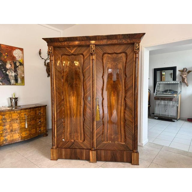Restored 2-Door Empire Columned Wardrobe/Bookcase/Hall Cabinet. Dimensions (measured at the cornice): Height x Width x...
