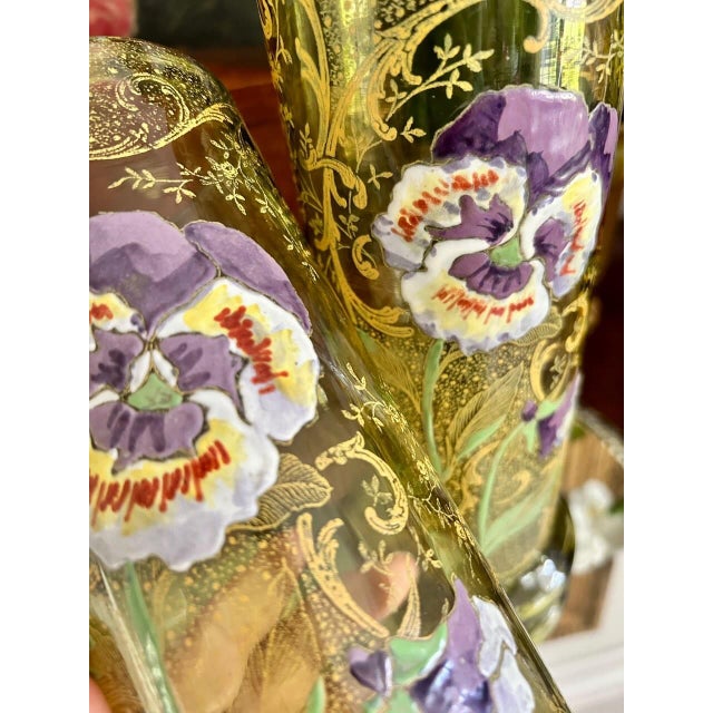 A beautiful pair of antique Mont Joye Legras art glass vases, finely decorated with hand-enameled violet pansies against a...