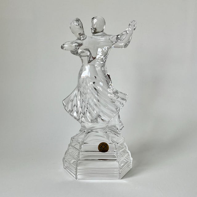 This elegant postmodern figural sculpture, titled "tango," is a documented piece from the "crystal & dance" collection...