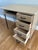 This MCM oak desk with hairpin legs has been carefully restored in our shop. The finish is a subtle paint wash with...