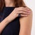 This striking contemporary sapphire and diamond ring is a bold and beautifully detailed design from the 2010’s, featuring...
