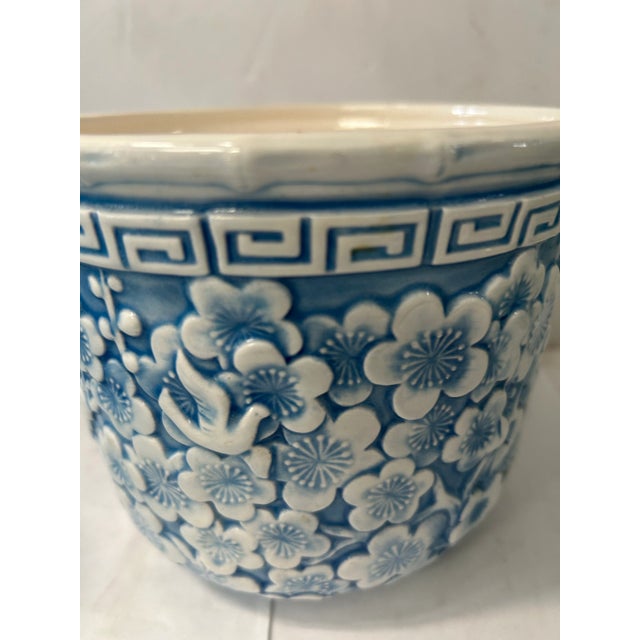 Beautiful floral cachepot with a faux bamboo and Greek key border design. A classic style that would be at home in any...