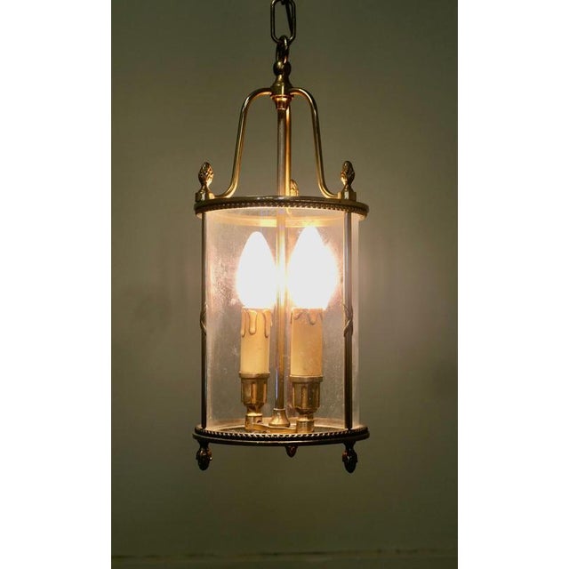 French Round Brass and Glass Lantern This lovely light has an internal circular glass panel The lantern has a twin candle...