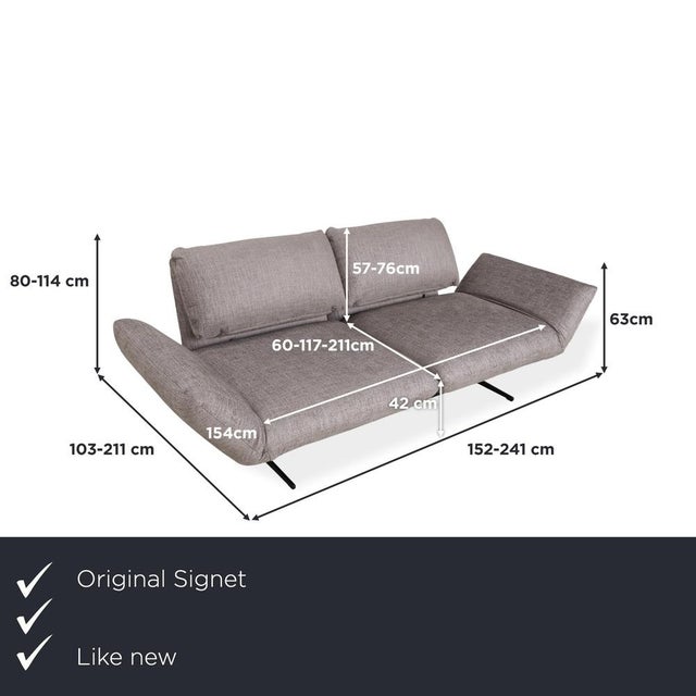 The Messina sofa impresses with its modern look. The design, upholstered in light gray fabric, appears pleasantly light...