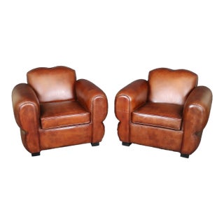Pair Cognac Hued French Art Deco Style Leather Moustache Club Chairs For Sale