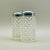 A pair of translucent white tipped hobnail glass salt and pepper shakers with chrome tops made by the Fenton Glass...