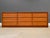 A mid century modern teak nine drawer dresser made by New Furniture. Made in Denmark. Circa 1960’s. Professionally...