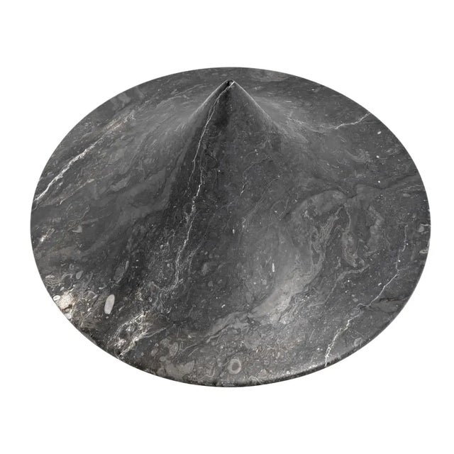 Crafted with meticulous attention to detail, these objects feature luxurious black marble, known for its timeless beauty...