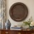 Large 24 inch vintage Chinese Fu brass wall tray with peacock, deer and bird motifs, a scalloped edge, dark patina and...