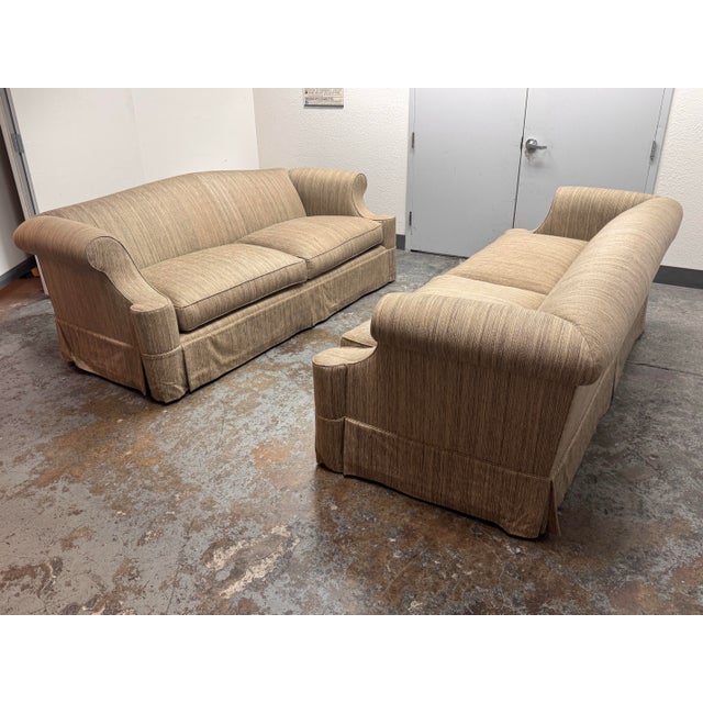 Design Plus Gallery presents a Pair of Bespoke Roll Arm Sofas by Belmar Fine Custom Upholstery. These sofas showcase...