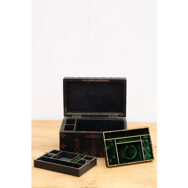 This exquisite jewelry box dates to the 1850s, where craftsmanship and elegance were paramount. A testament to timeless...