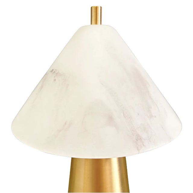 Light up your space with Farley, the rechargeable mini table lamp. Featuring a faux alabaster tapered shade and a brass...