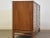 A mid century modern chestnut dresser with steel colored accents professionally refinished in a rich walnut color. 56”...