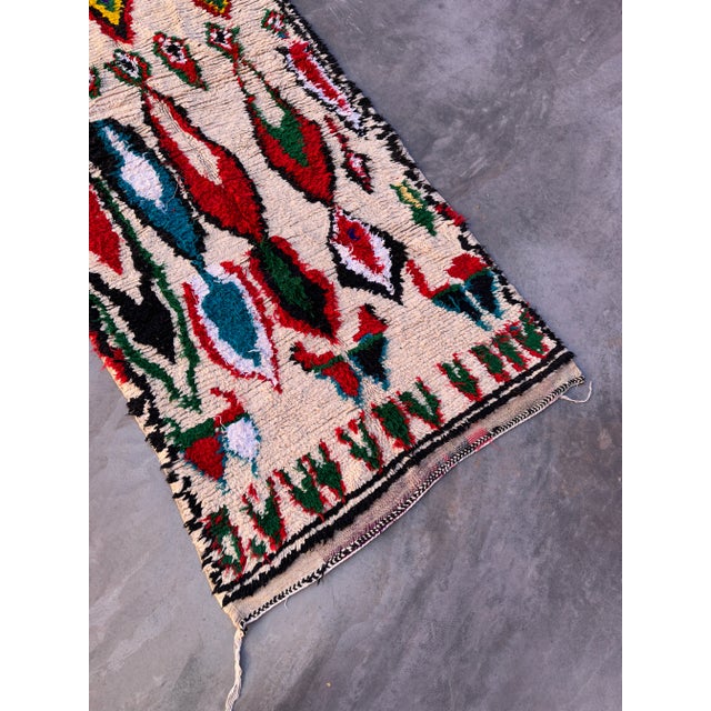 Unlike many of the low grade wool, mass produced factory pieces, the vintage Azilal rug is handwoven using craft weaving...
