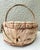 Very unique vintage handmade natural woven basket comprised of wood, husk and dried leaves. Measures: 11” x 11” x 13”...