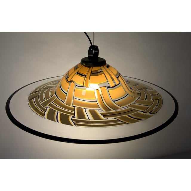 An extremely large suspension piece. This design is uniquely attributed to Barovier & Toso and is composed of a beautiful...