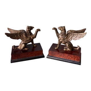 Griffin Bookends on Wooden Bases - a Pair For Sale