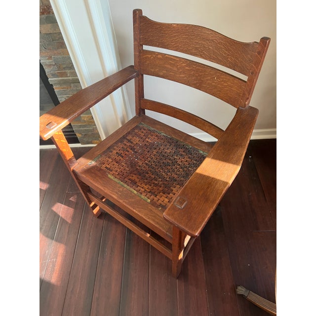 Truly one of a kind early 1900’s antique Stickley prototype chair marked “patent pending”. Quarter sawn oak ladder back...