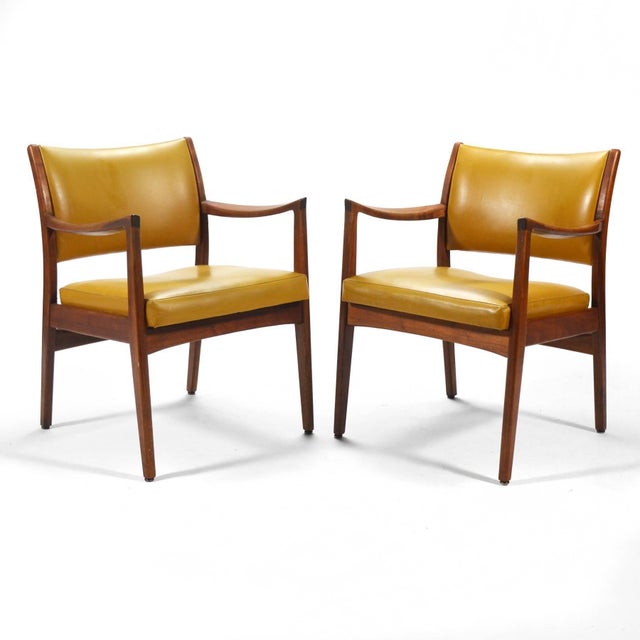 These armchairs by the Johnson Chair Company have beautiful sculpted walnut frames with very striking arms. They remind us...