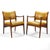 These armchairs by the Johnson Chair Company have beautiful sculpted walnut frames with very striking arms. They remind us...