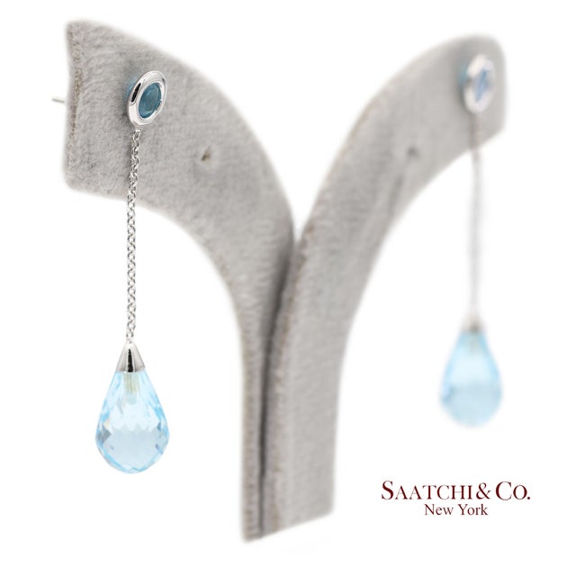 18k Solid White Gold Blue Topaz Drop Earrings Metal Type: 18k Solid White Gold Total Item Weight: 3.1 Grams Length: 39.0...