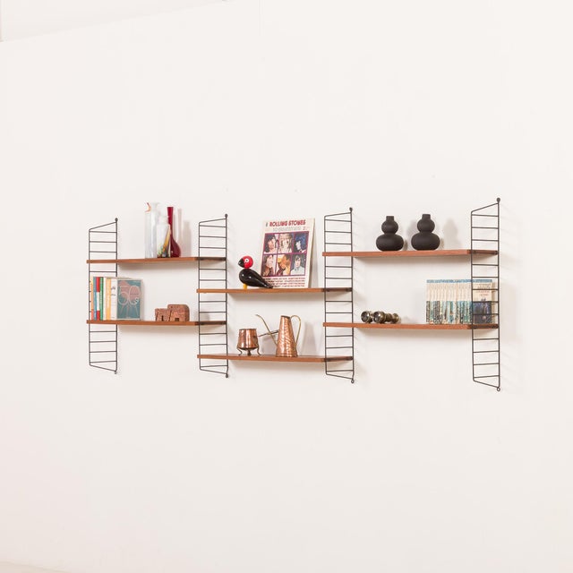 This iconic scandinavian shelving system was designed by famous architects kajsa and nisse strinning. Originally...