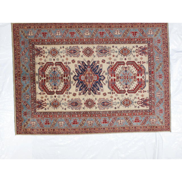 This master piece is a Ghazni wool pile very fine genuine hand woven Super quality Khotan carpet in mint condition.
