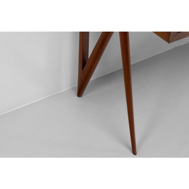 This highly elegant sideboard, designed and manufactured by La Permanente Mobili Cantù in Italy during the 1950s, is a...