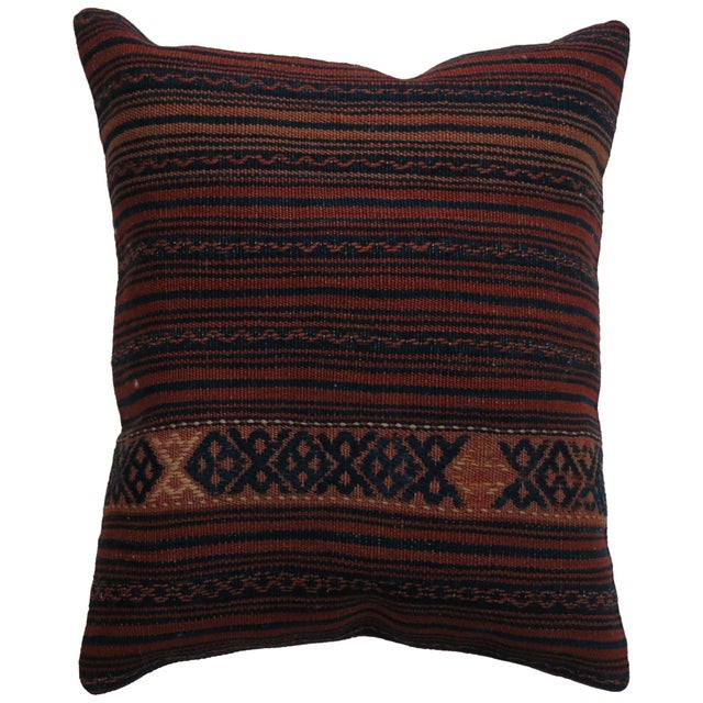 Vintage Turkish Kilim in rusty reds and blue accents. Measures: 18" x 20".