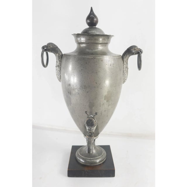We are selling this 19th or 18th Century English Pewter Hot Water Pot with Egyptian Revival or Regency style with some...