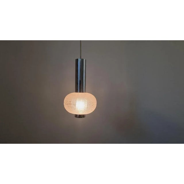 Very nice style of lighting - rare type. This piece is attributed to the mentioned designer/maker. It has no attribution...