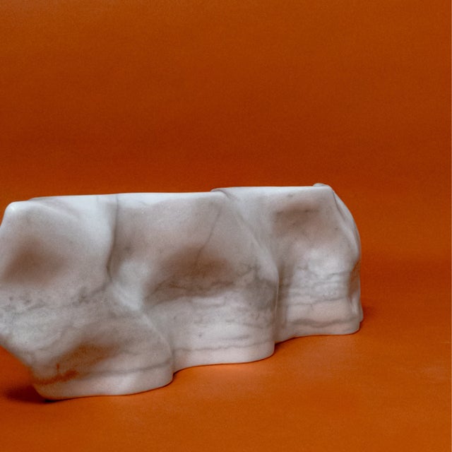 Abstract marble sculpture titled Wave, attributed to the Spanish sculptor D. Beresaluze. The piece features an organic and...