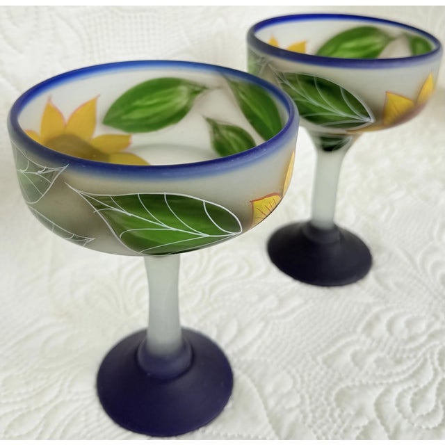 Celebrate in vibrant vintage style with this stunning **set of two large Mexican margarita glasses**, expertly hand-blown...