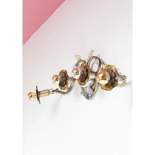 Top quality wall light. It's quite heavy for its size. The piece is whether Italian from Banci or French from Maison...