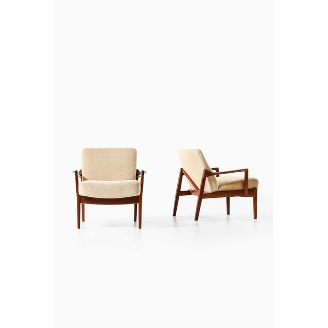 This rare pair of easy chairs, model fd125, designed by tove and edvard kindt-larsen and produced by france & daverkosen...
